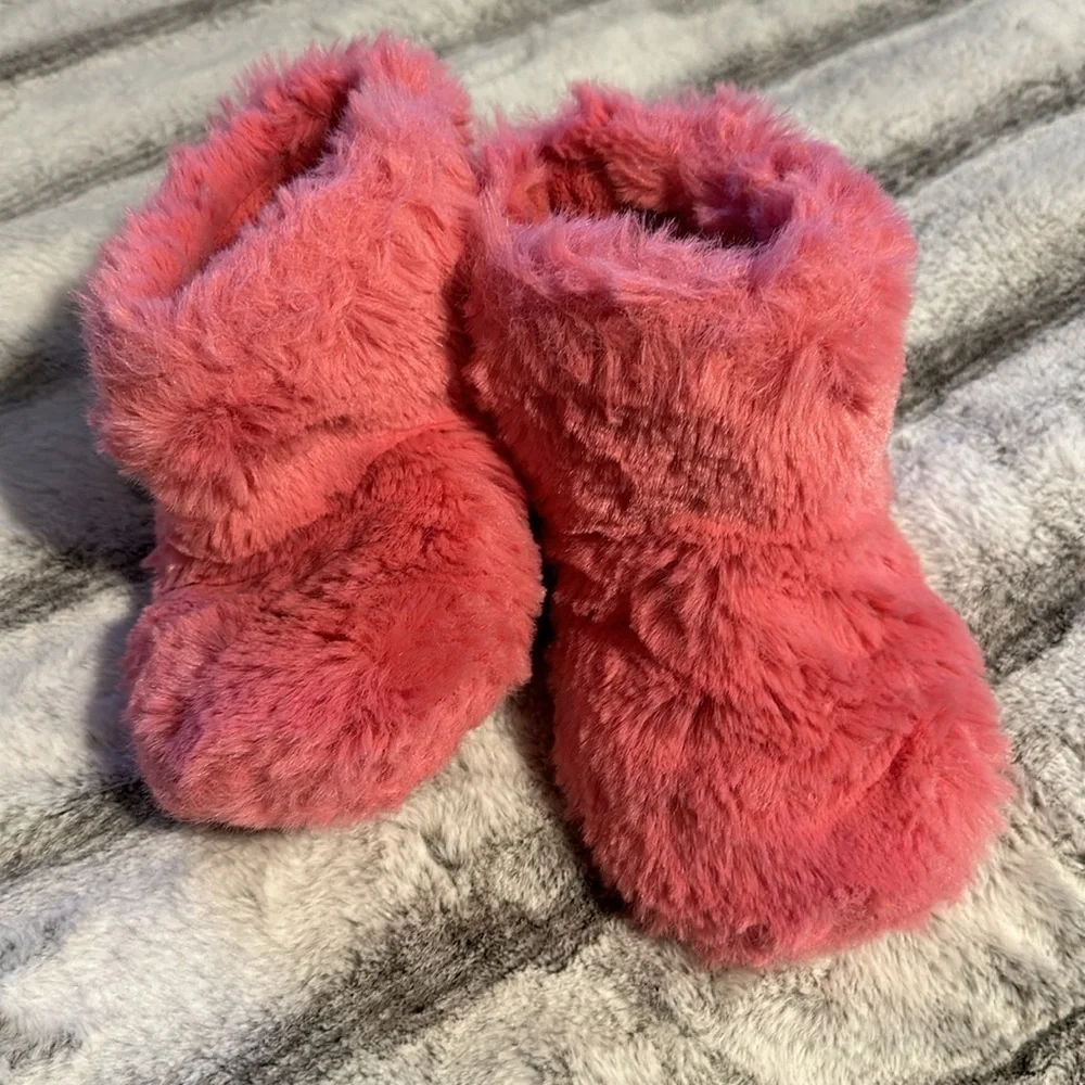 Pink fuzzy booty slippers